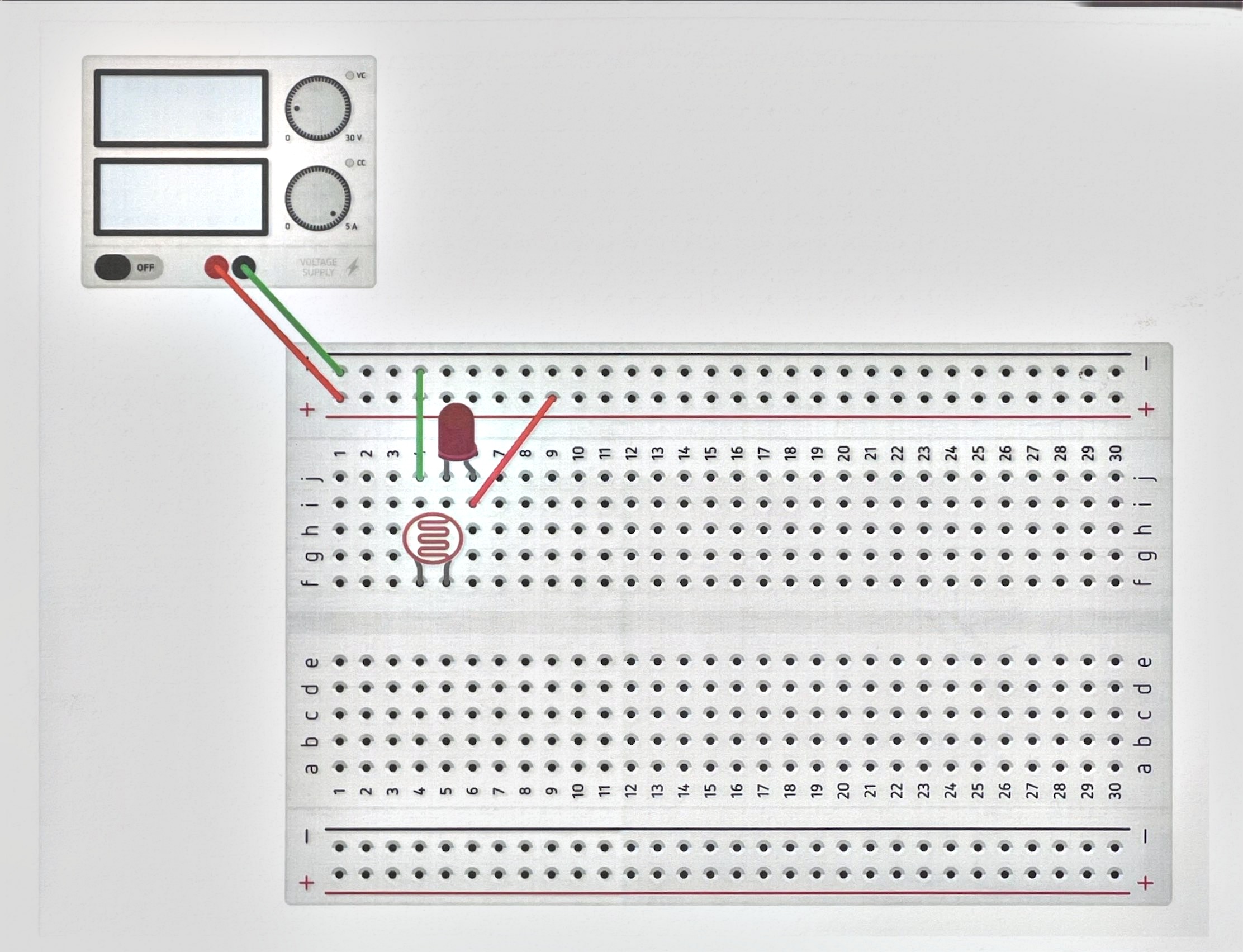 Diagram 7: a breadboard with a 5V power supply, an LED, and a photoresistor.