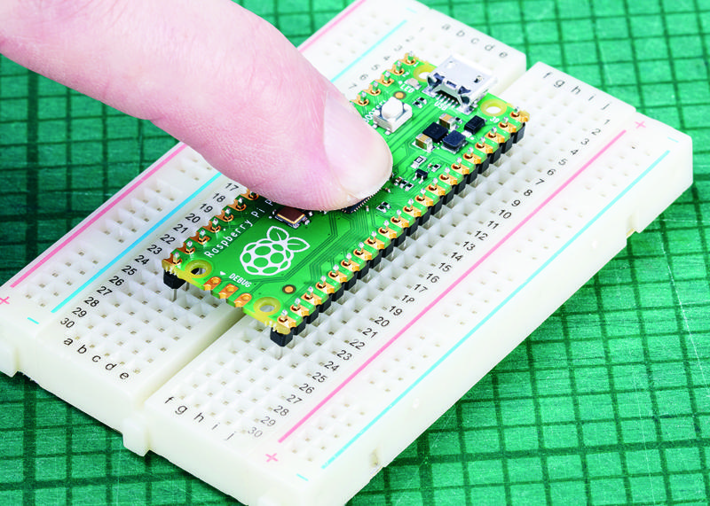 Figure 1-10: Alternatively, use a breadboard to hold the headers in place for soldering