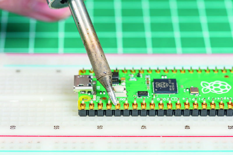 Figure 1-11: Heat the pin and pad