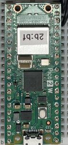 A Raspberry Pi Pico 2 W seated in a breadboard, USB end at the bottom